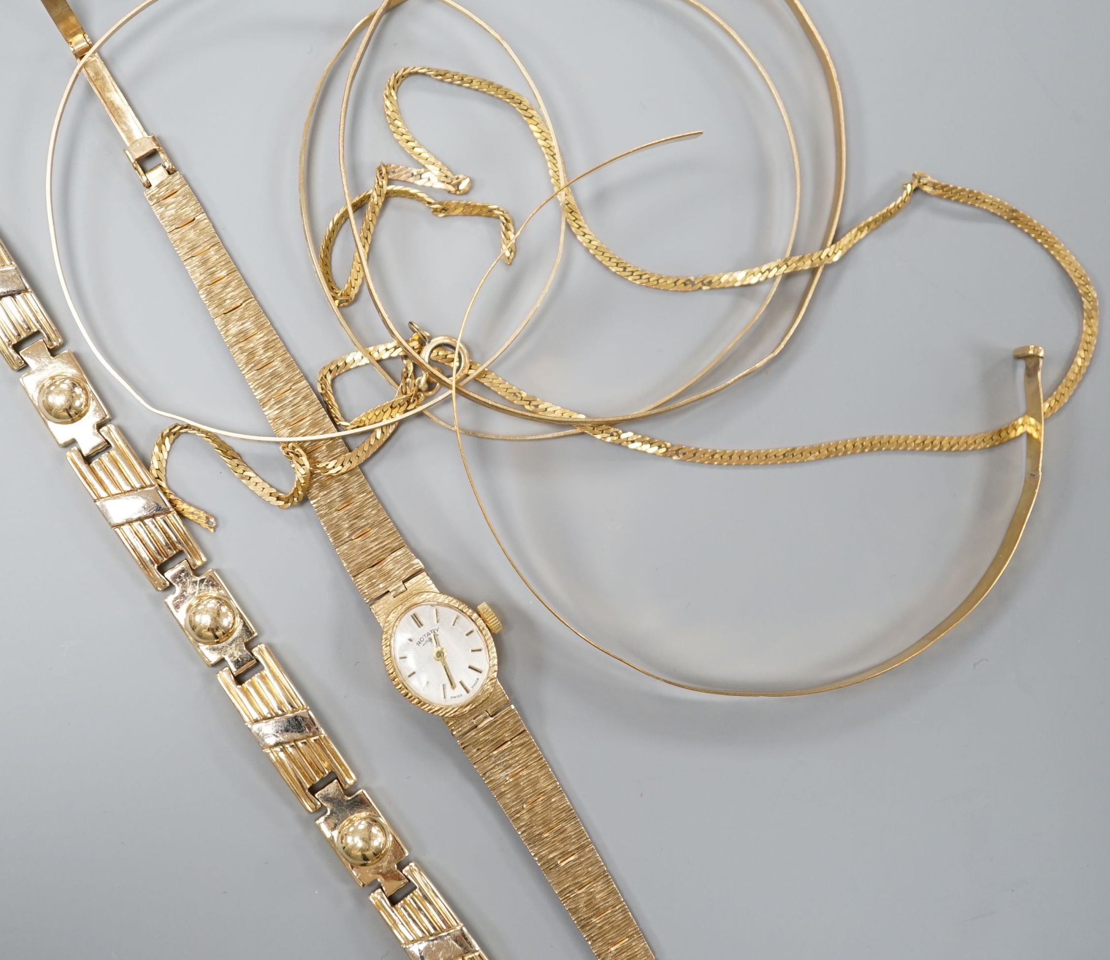 A lady's 9ct gold Rotary manual wind wrist watch on 9ct bracelet, gross 15.4 grams, five damaged 9ct gold items, 15 grams and a 585 yellow metal bracelet, 29.5 grams.